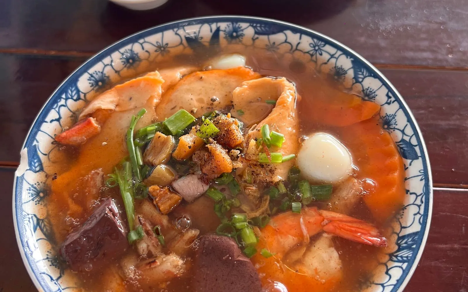 A bowl of banh canh ghe, crab and seafood noodle soup, in An Thoi, Phu Quoc
