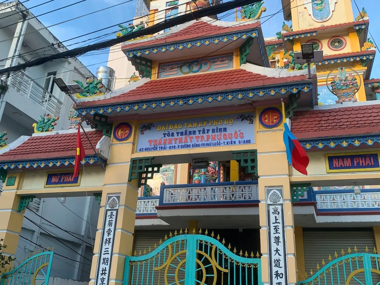 The colourful twin-towered facade of the Cao Dai temple in Duong Dong