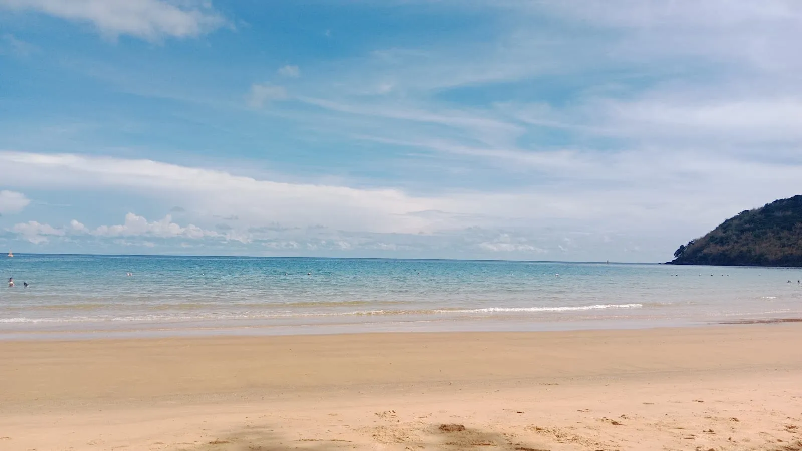 The sandy beach and calm sea at Dam Trau, Con Dao