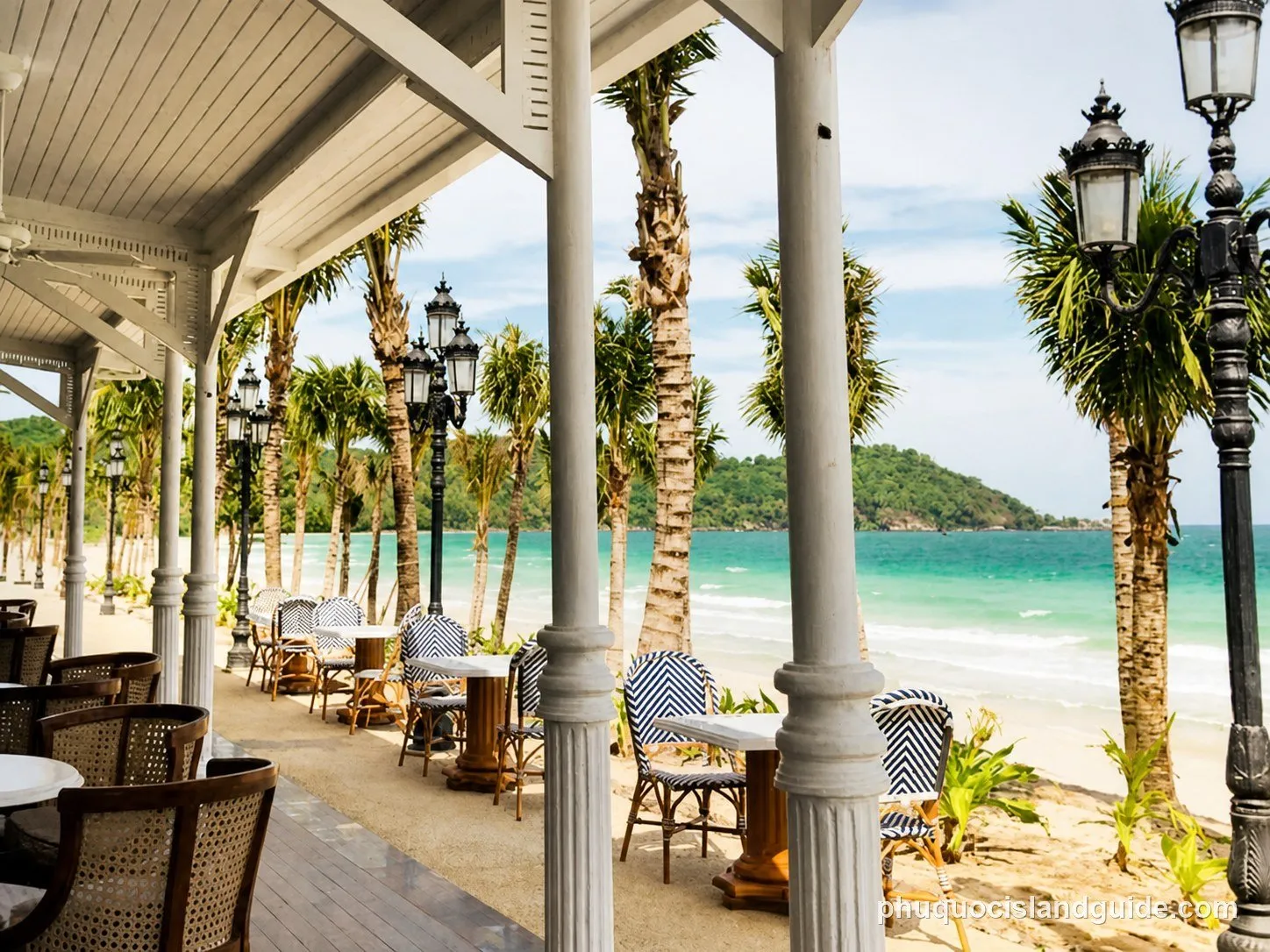 The veranda of the Department of Chemistry Bar at JW Marriott Phu Quoc, looking out to the beach