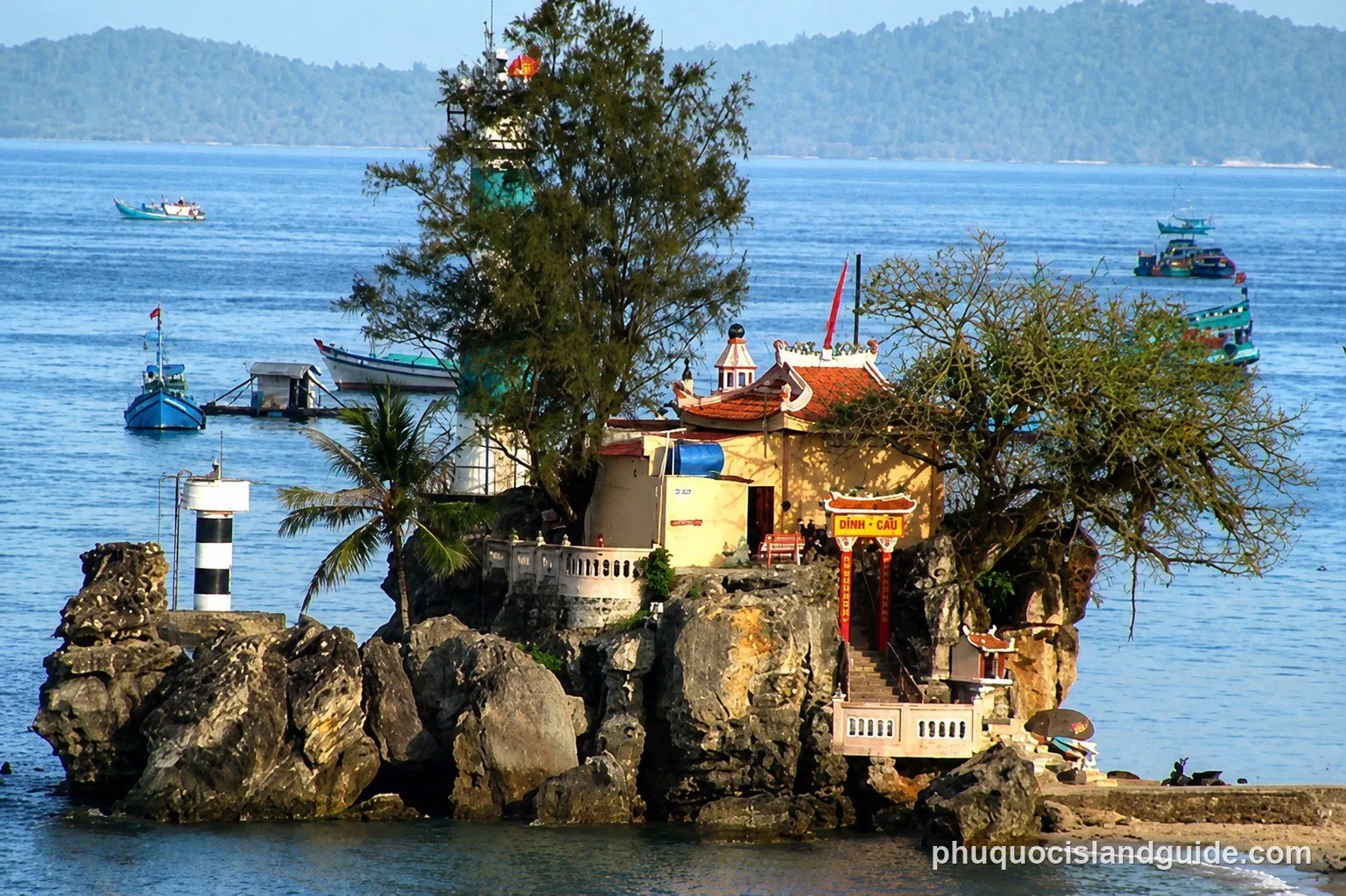 Dinh Cau, the temple and lighthouse on a rock at the mouth of the Duong Dong River