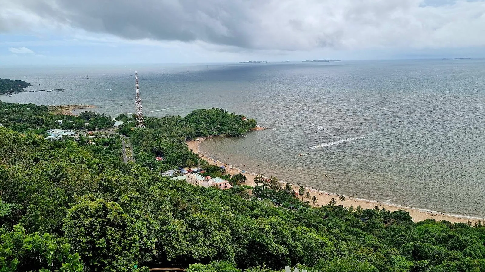 The forested headland and curving beach of Mui Nai at Ha Tien, seen from above