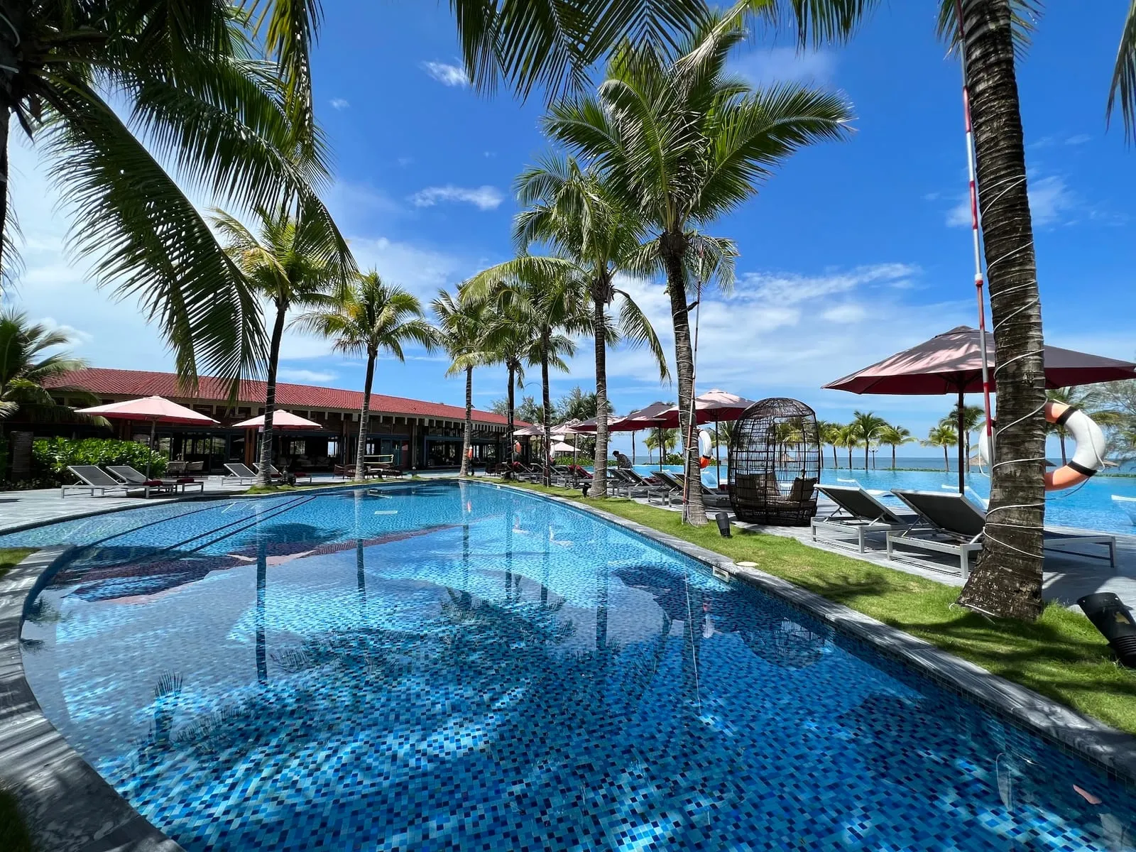 Pool and beach at Mövenpick Resort Waverly Phu Quoc