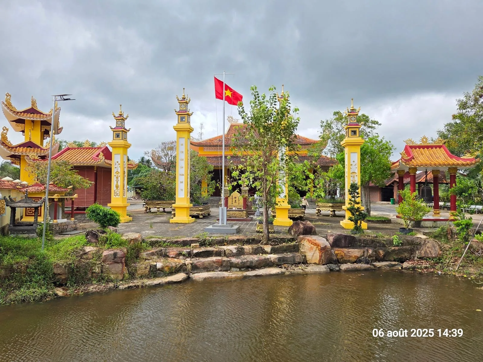 The gate and lotus pond of the Nguyen Trung Truc shrine at Cua Can