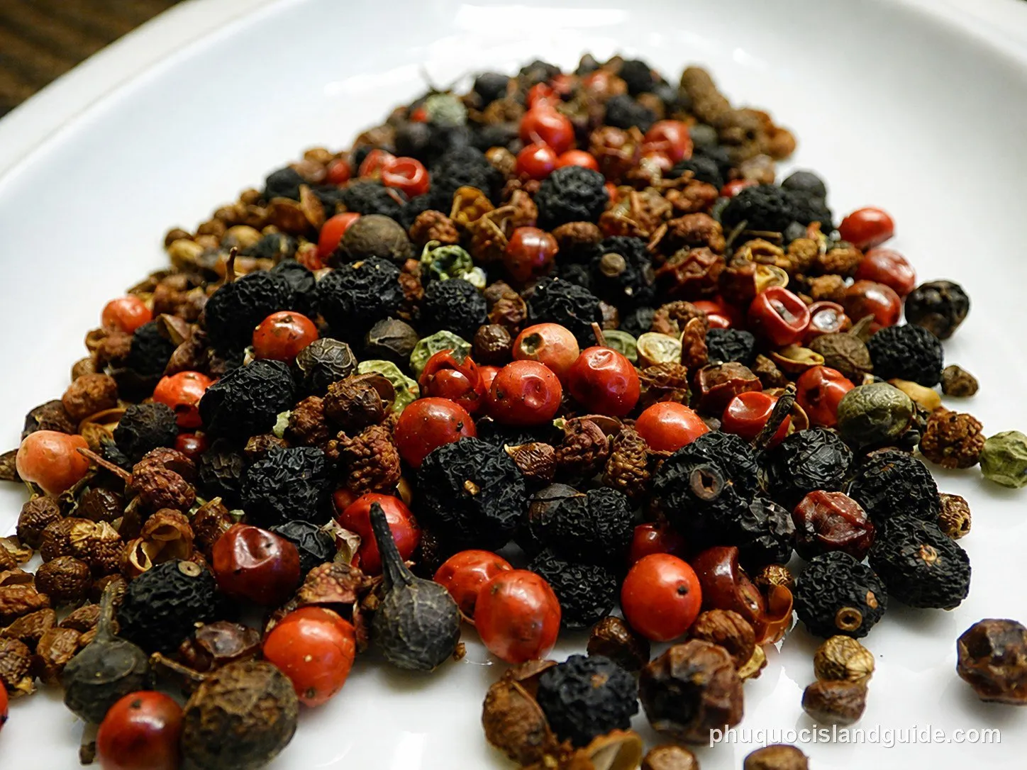 Mixed dried peppercorns: red, black and brown