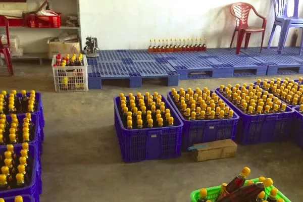 Crates of bottled Phu Quoc fish sauce ready to leave the factory