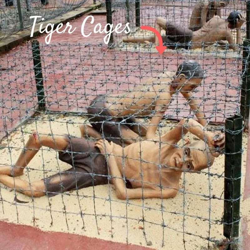 Emaciated figures in barbed wire cages, lying on sand, with the text ‘Tiger Cages’ and an arrow overlaid on the image.