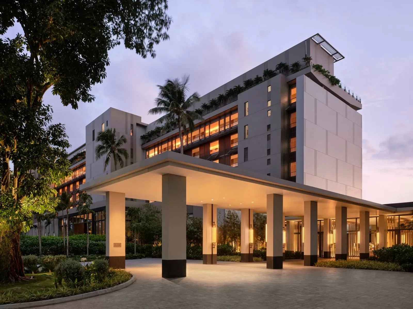 Regent Phu Quoc main building and porte-cochère at dusk