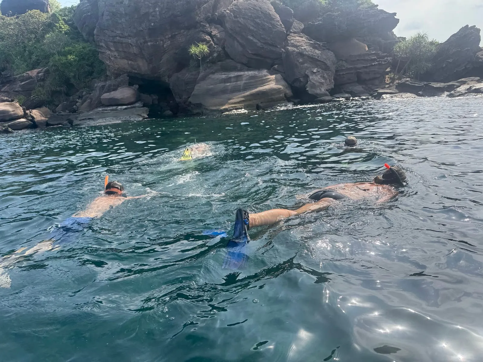 Snorkellers in clear water off an island near Phu Quoc