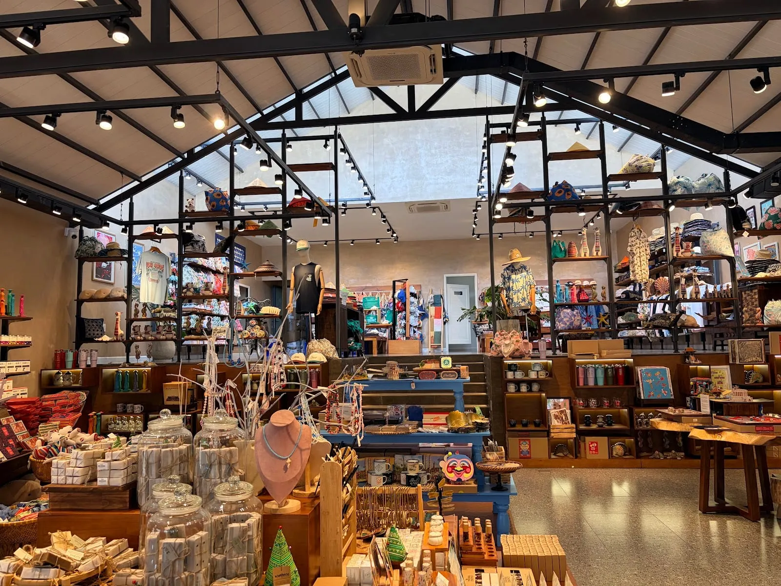 Shelves of local crafts, food and gifts inside the LOCA souvenir shop in Duong Dong