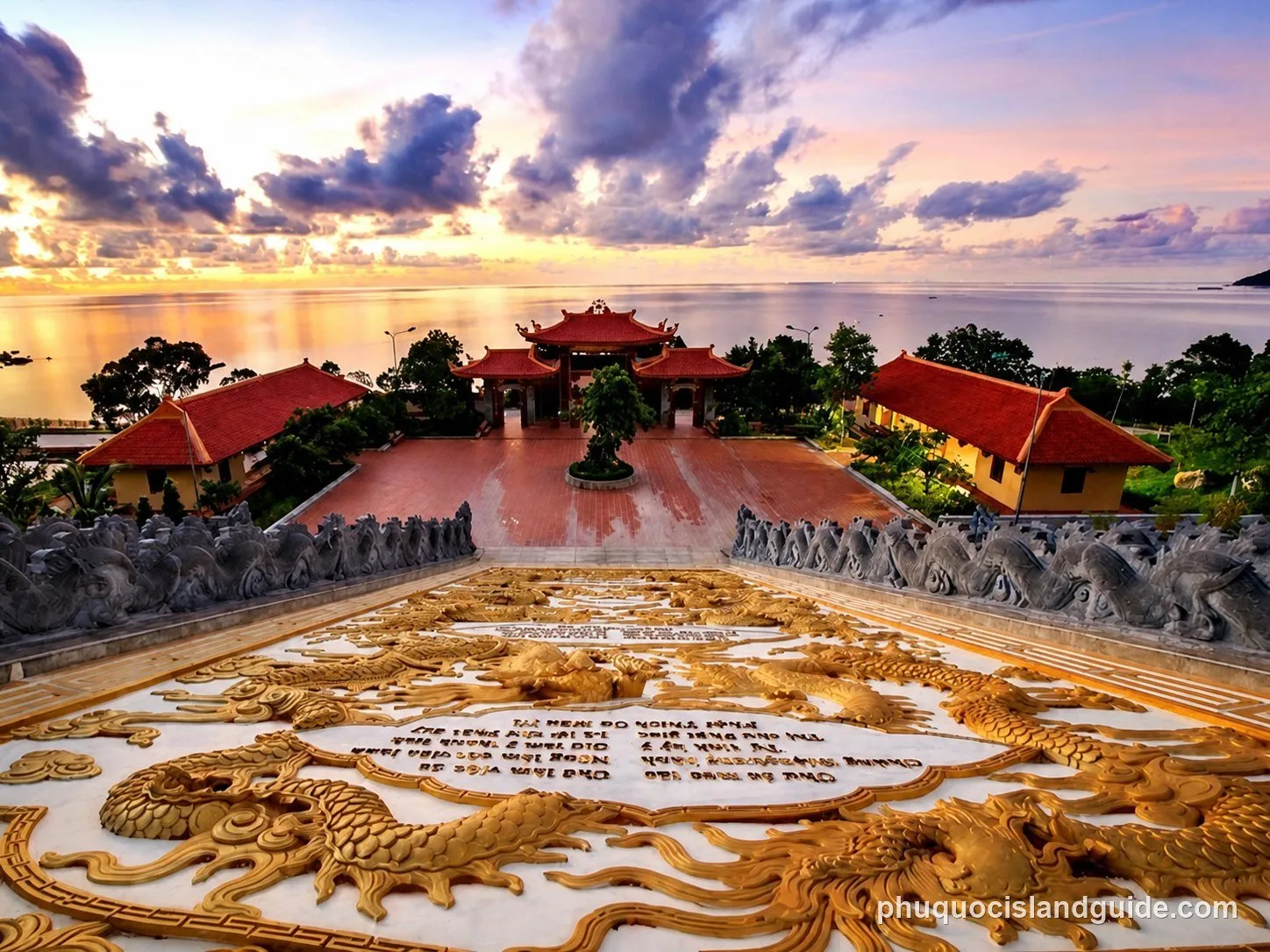 Ho Quoc Pagoda’s golden dragon carvings, looking out over the sea