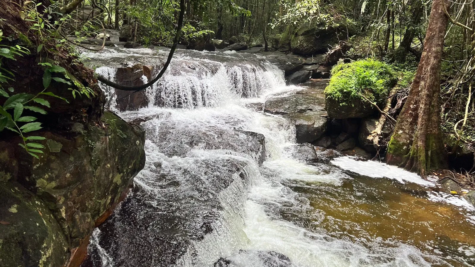 Water cascading over rocks at Suoi Tien stream