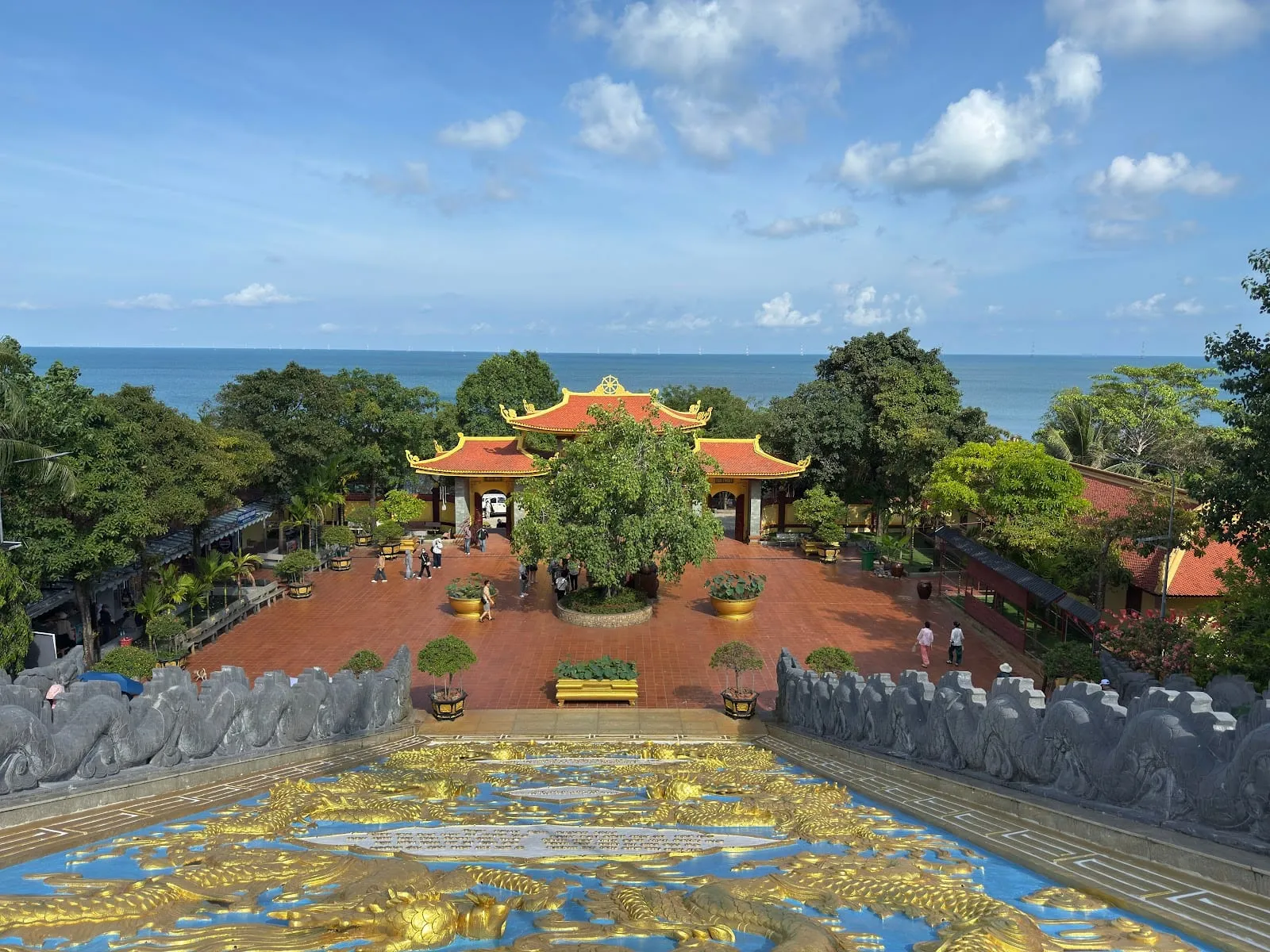 Ho Quoc Pagoda's courtyard and halls on the hillside above the sea